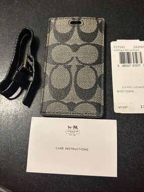 Coach Black and White Signature PVC Luggage Tag with Strap